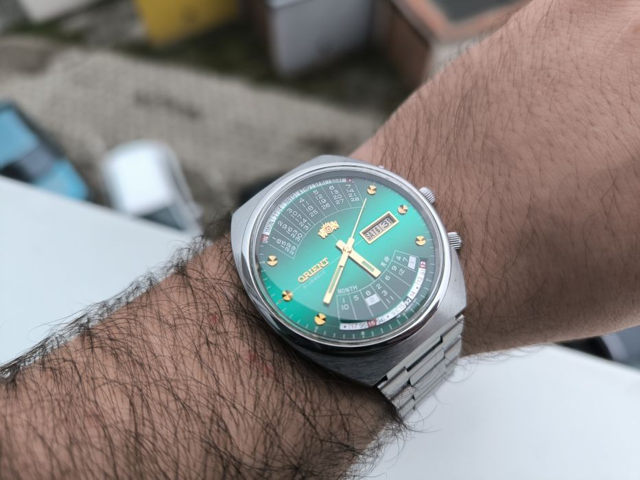 STAN NOWY zegarek orient zieleń cesarski patelnia królewski multi year