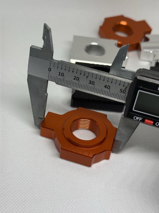 Блок регулювання натяжника для ланцюга