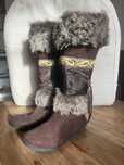 Botas castanhas de Pelo
