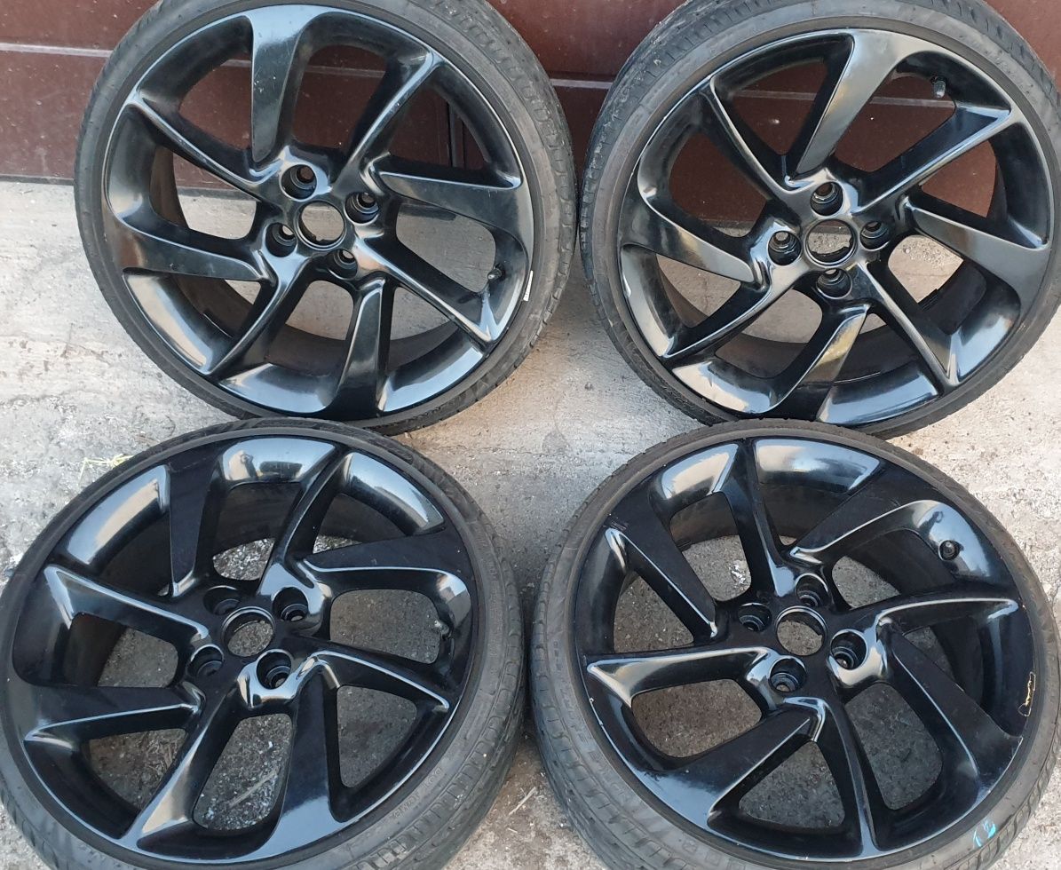 Alufelgi Opel 17 4x100 ET 44 7J Felgi czarne Adam Corsa Vectra Meriva