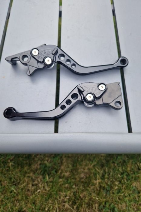Рычаги мотоцикла, курки тормоза и сцепления, универсальные ручки