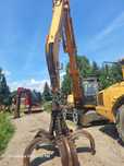 Liebherr A904 przeladunek  Koparka przeLadunkowa Liebherr a 904 z chwytakiem Liebherr
