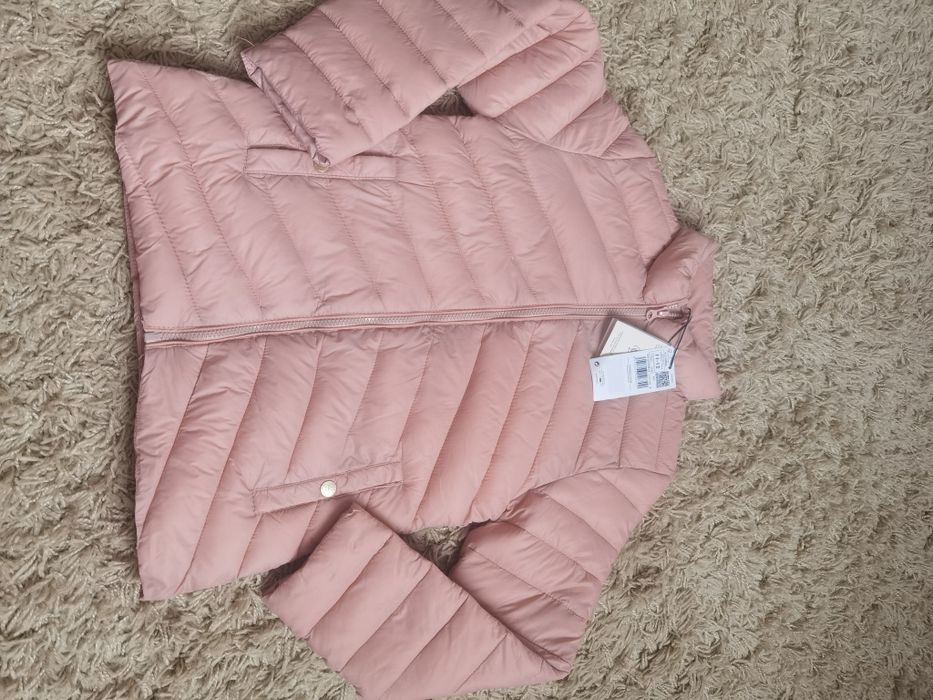 Нова курточка 152р.