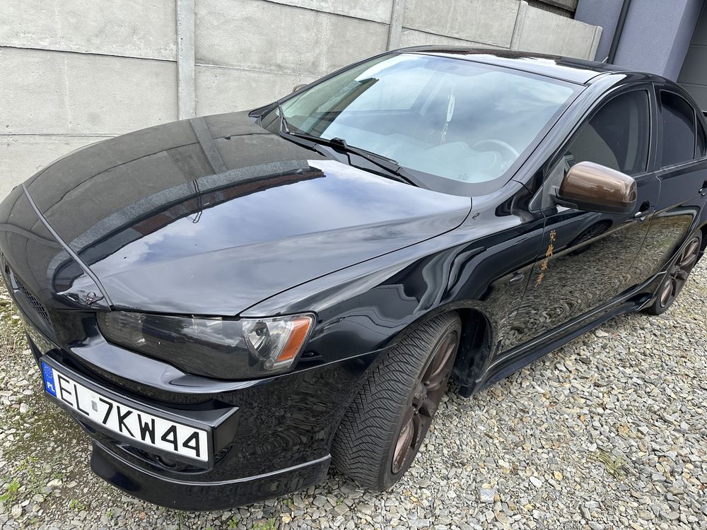 Mitsubishi Lancer 2012 oszczędny zrobiony na styl EVO przebieg 63771km