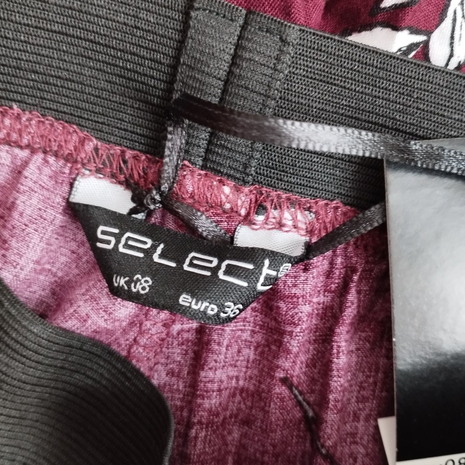 Nowe damskie spodnie Select z metką – bordowe w kwiaty, rozmiar 36/38