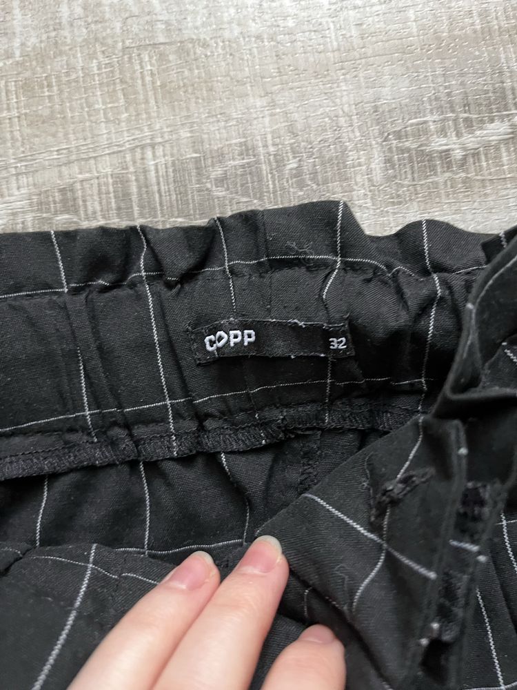 Spodnie w kratkę z paskiem cropp