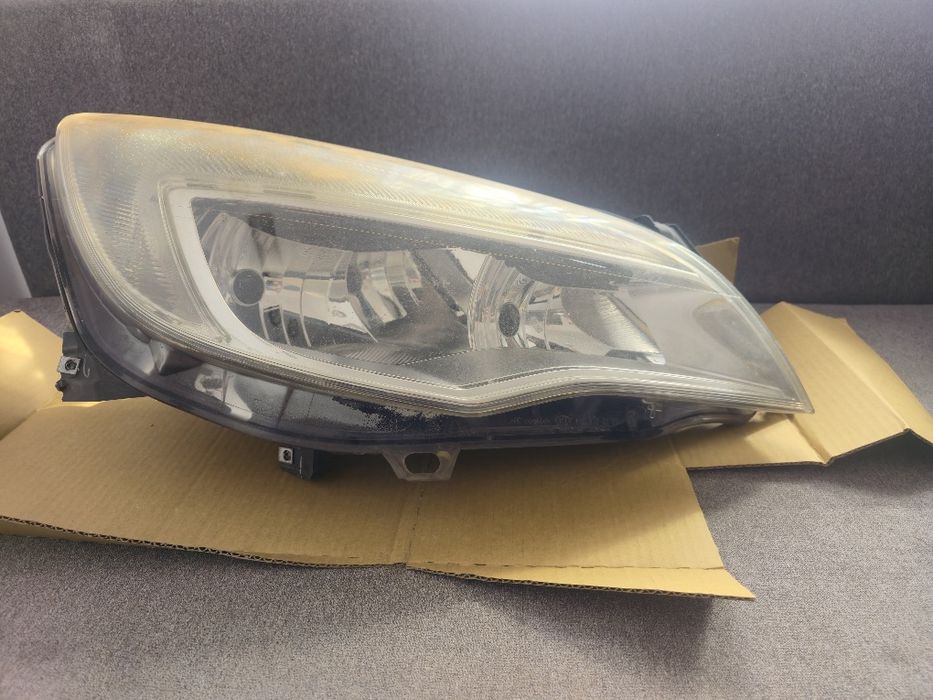 Farol Opel Astra 2011