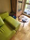 Skórzana zielona sofa z funkcją spania