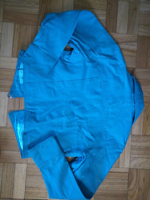 Casacos em pele em estado de novo