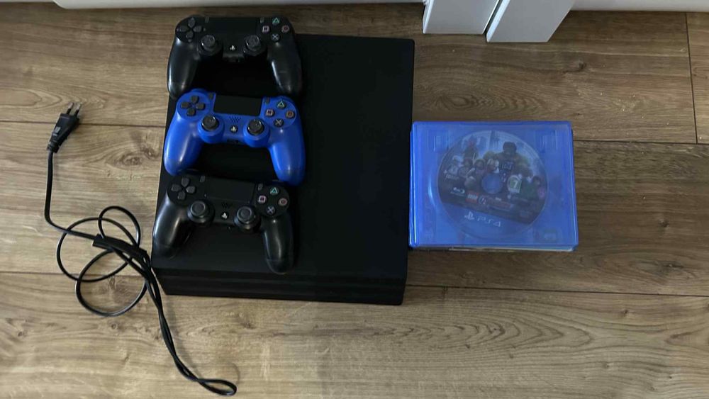 Ps4 pro 1tb 3 pady +8 gier