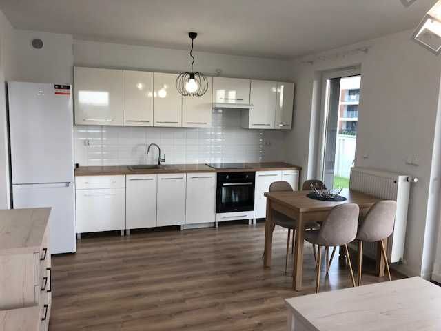 3-pokojowy apartament z miejscem postojowym w garażu i ogrodem 98m2