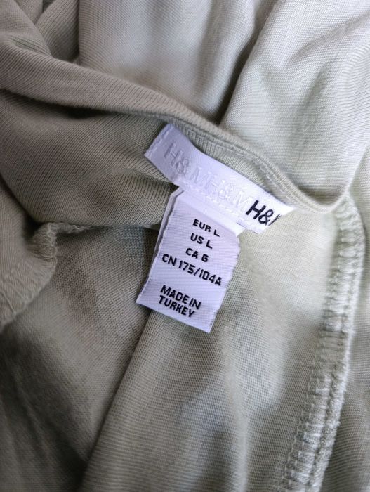 pistacjowa szałwiowa sukienka falbanami L letnia maskuje oponkę brzuch