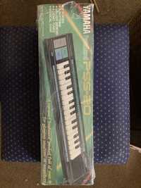 Piano electrónico Yamaha de criança