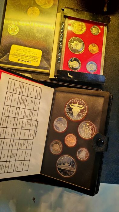 Zestaw monet część srebrna wszystkie proof set Polska Kanada itd