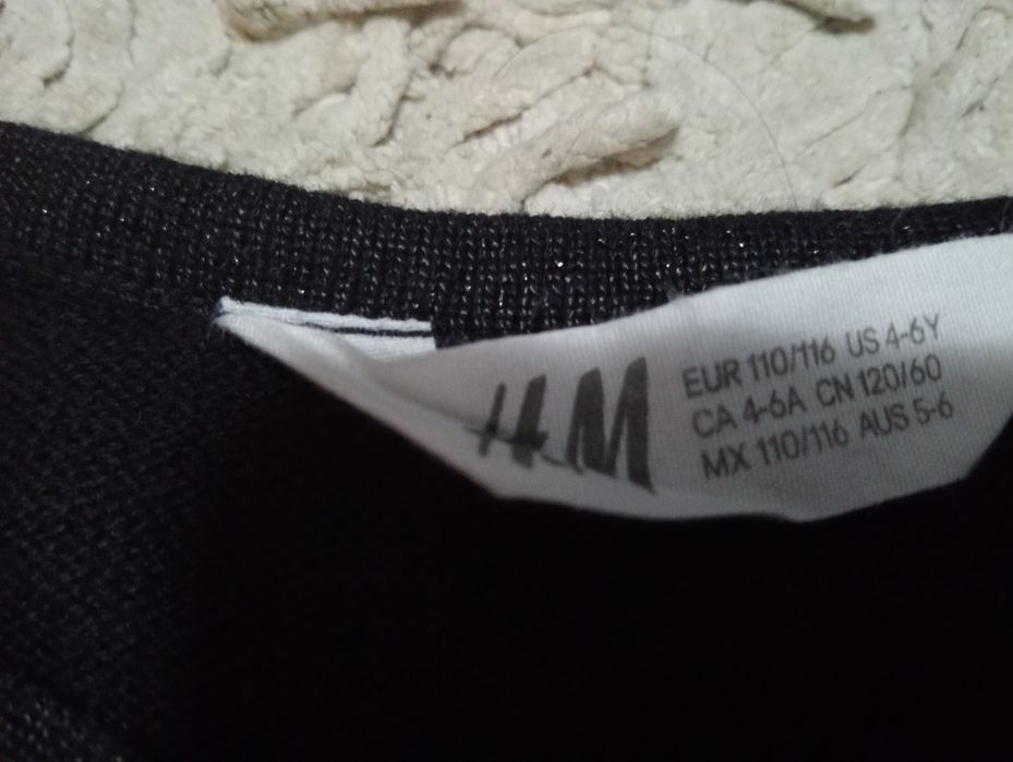 Czarny sweterek - bolerko HM roz.110-116.