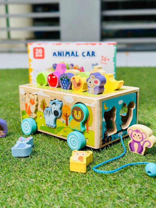 Деревʼяна каталка-сортер «Тваринки»