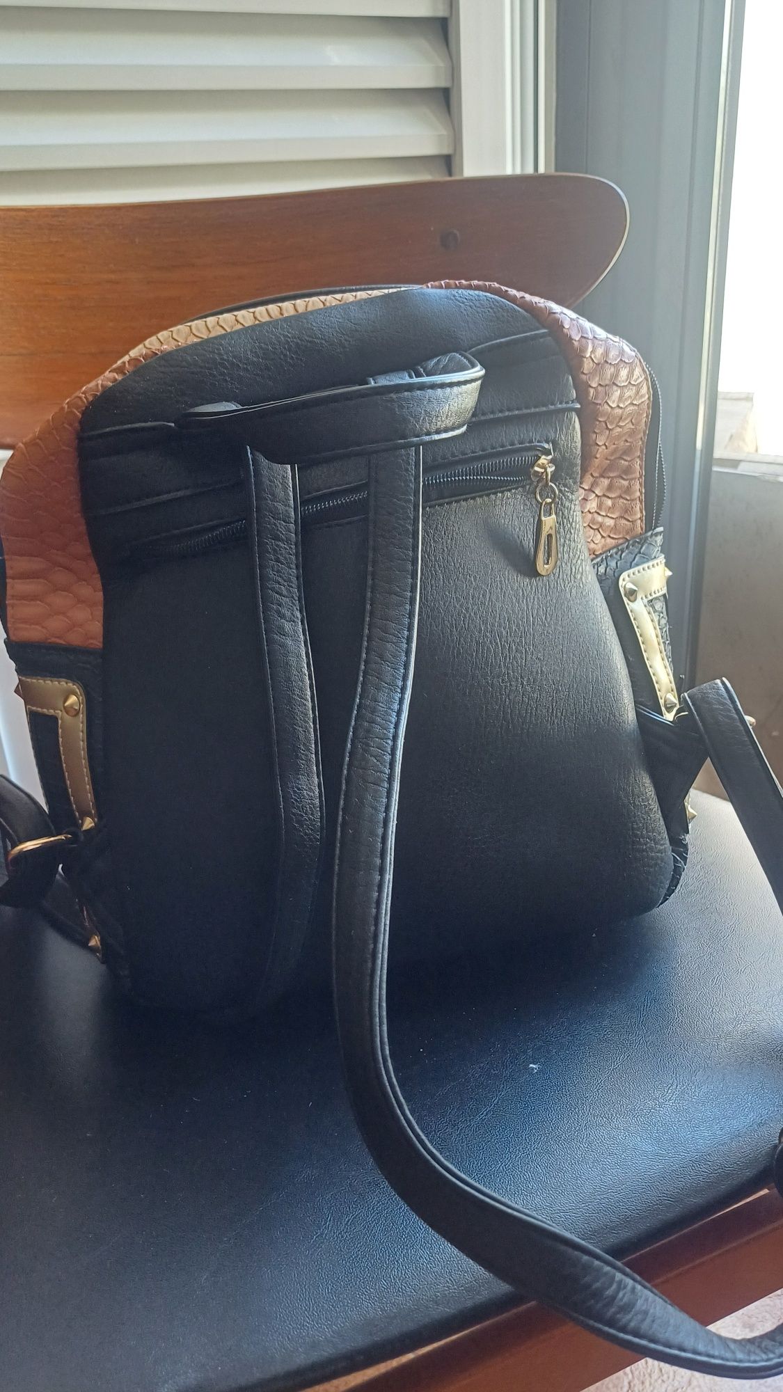 Mochila MK pouco usada