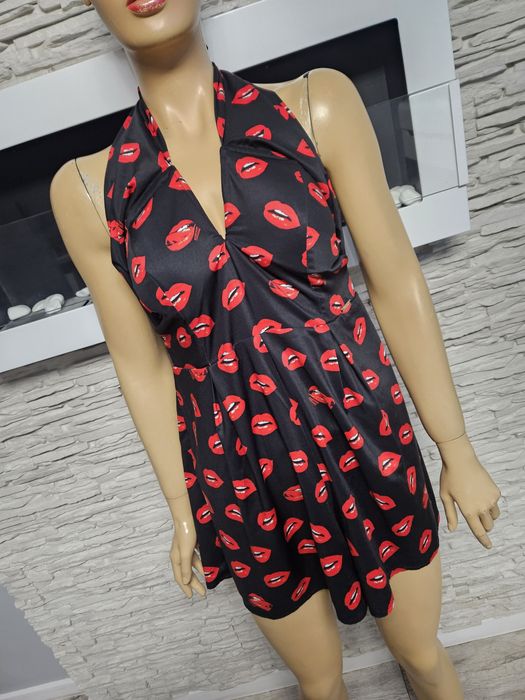 Kombinezon na lato elegancki Guess rozm M w usta