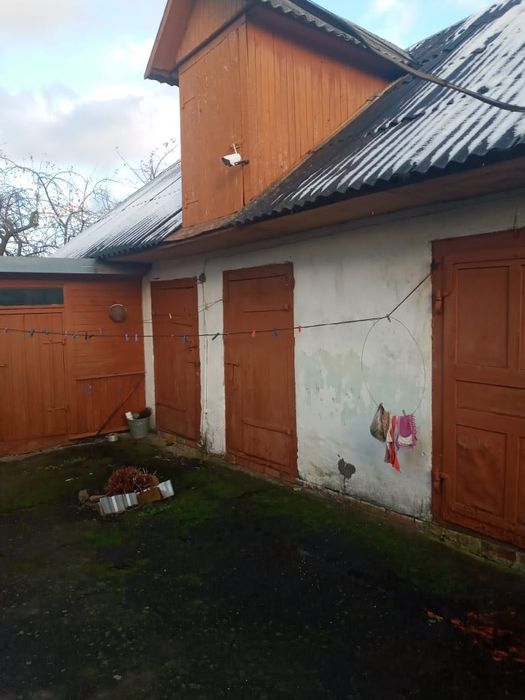 Продам деревʼяний будинок