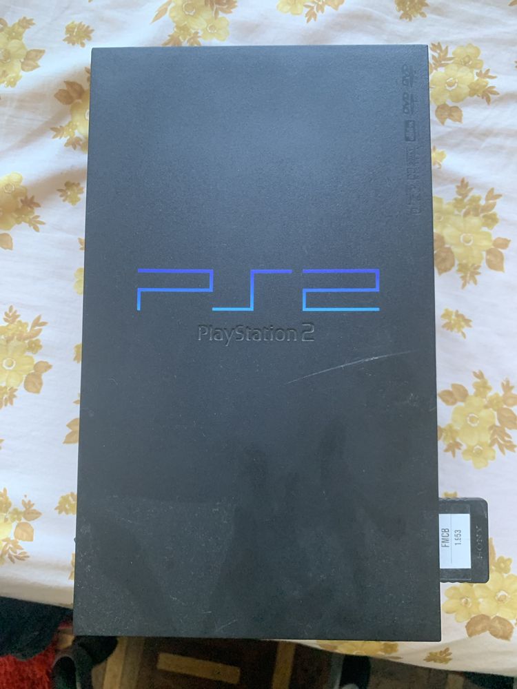 PS2 (Playstation 2) + memory card desbloqueado + cabo de alimentaçao.