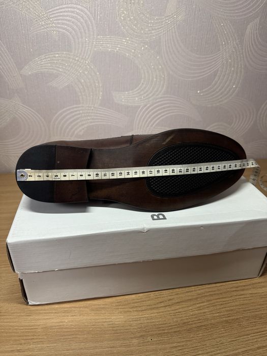 Продам нові чоловічі шкіряні темно-коричневі туфлі