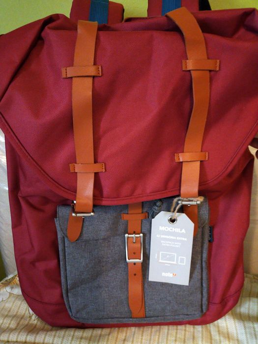 Mochilas em tecido /napa. NOVAS