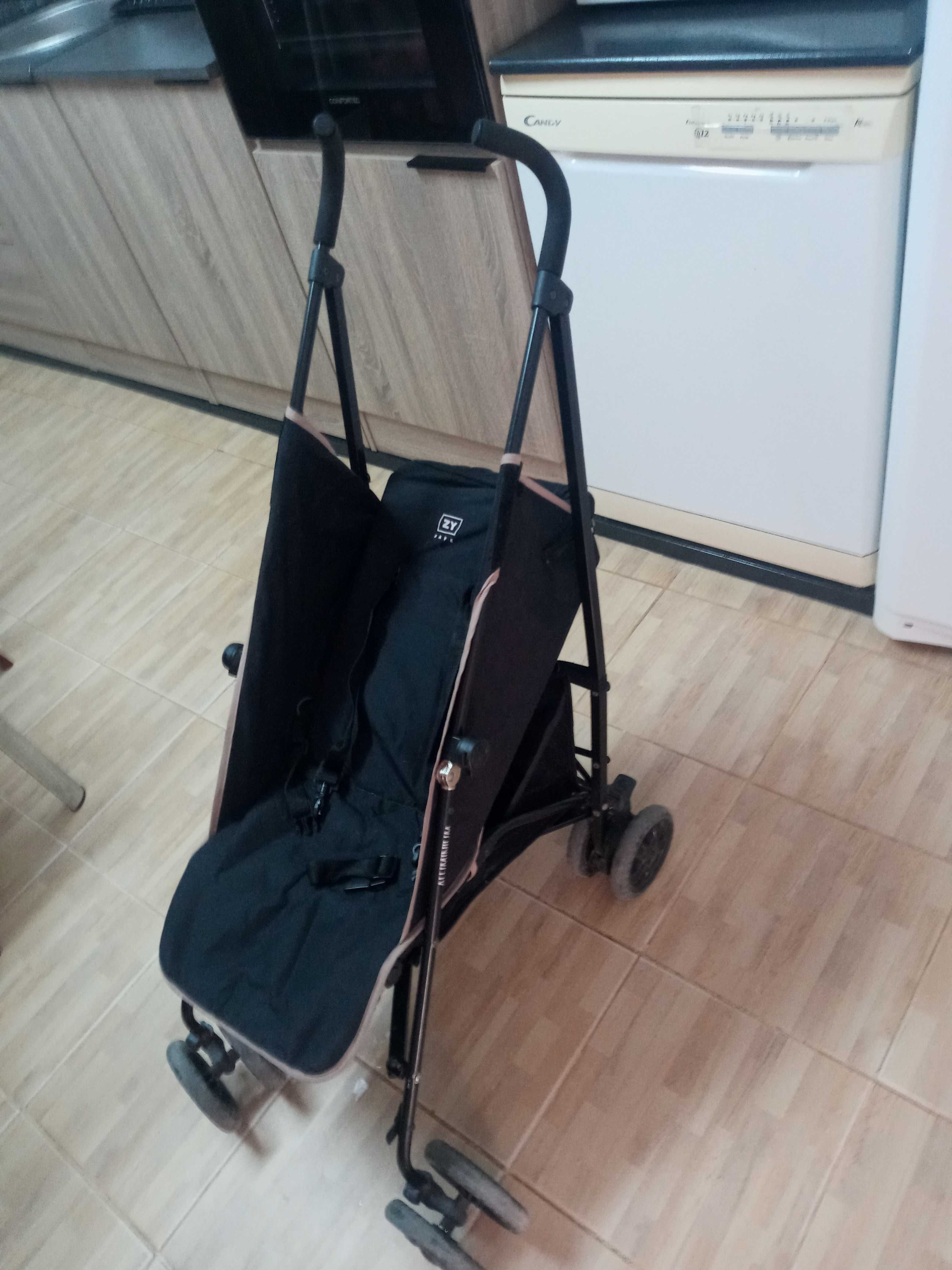 Carrinho de passeio com cesto ,deita e ajusta nas pernas .otimo estado