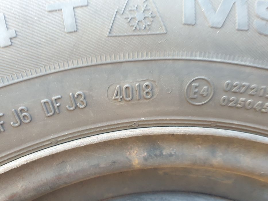 Kola zimowe Vw Polo VI 185 70 R14  z kołpakami VW