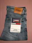 Wyprzedaż spodnie męskie Tommy Jeans.