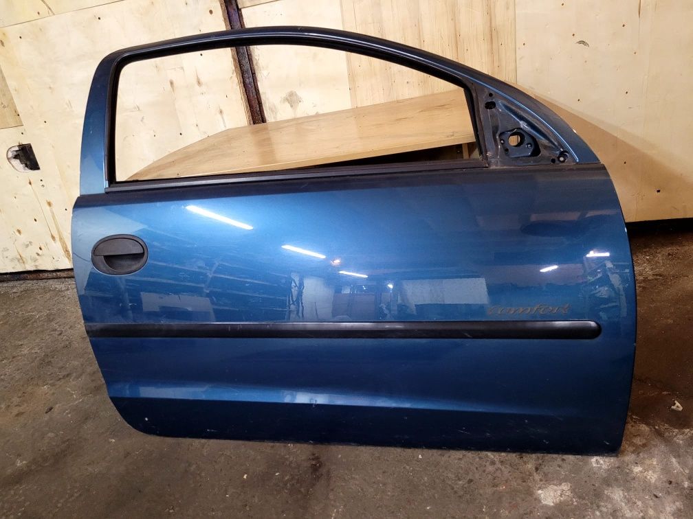 Drzwi szyba prawe przód przednia opel corsa c Z20M 3 drzwi