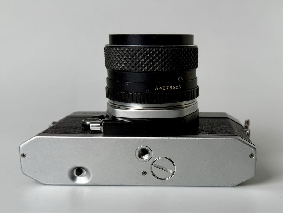 Плівкова Yashica FX-2 з Yashica DSB 50/1.9 та конвертером 2x Yus