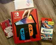 Nintendo Switch OLED z dwoma grami, na gwarancji
