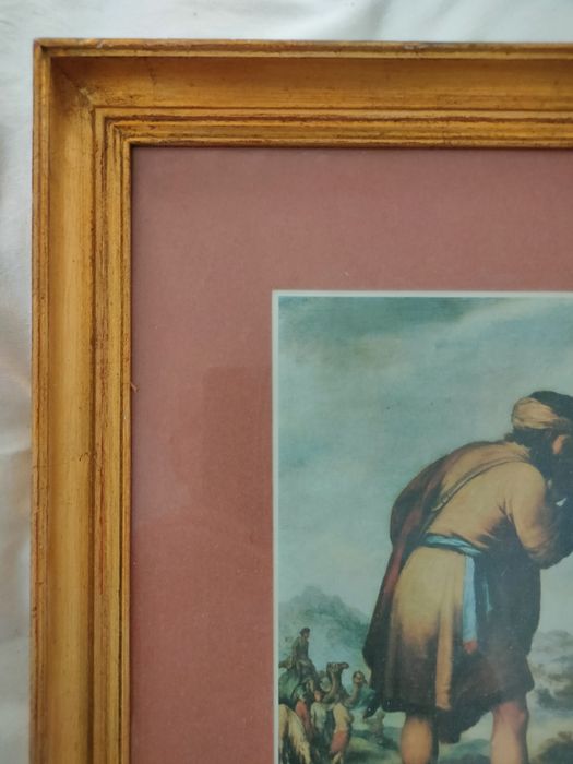 Moldura com cópia de pintura de Murillo.