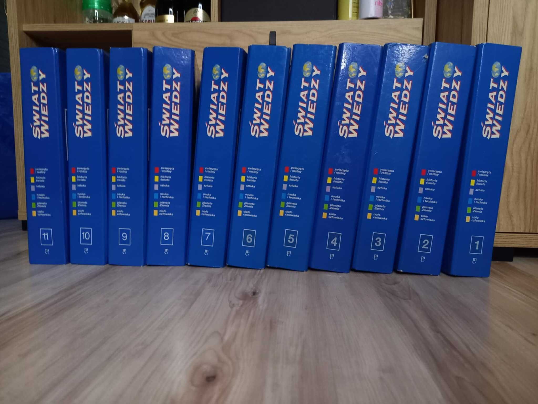 Pełny zestaw - kolekcja - Świat Wiedzy z segregatorami + 4 dodatki