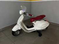 Mota eletrica vespa (semi nova para criança)