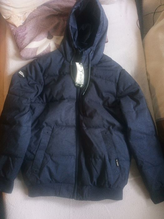 Продам новый мужской пуховик