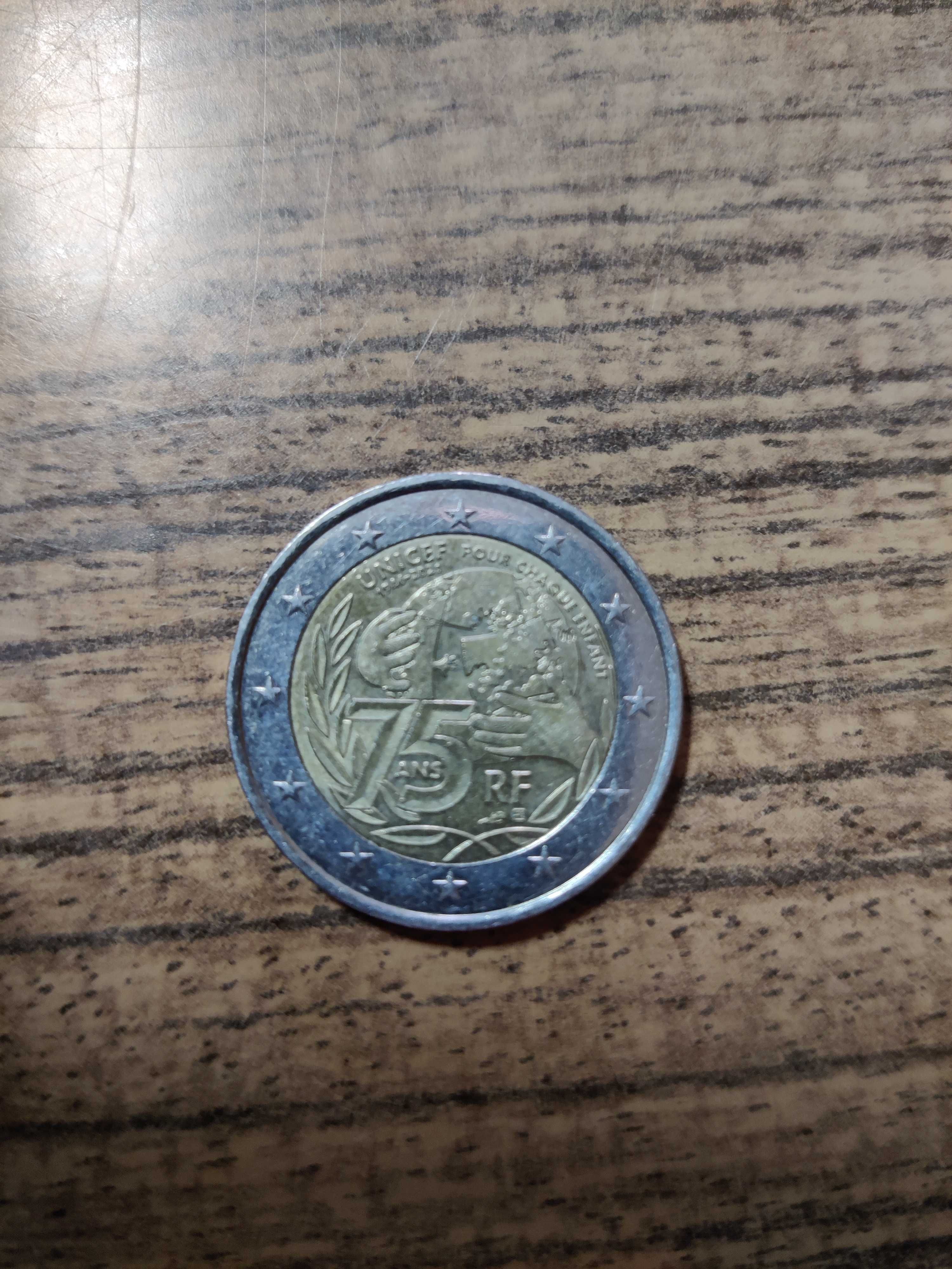 Moedas de 2 comemorativas e moeda de 2 grega com "s"