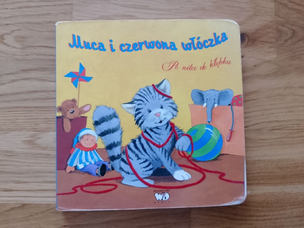 Muca i czerwona włóczka - po nitce do kłębka