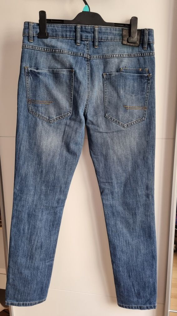 Spodnie męskie jeansy Reserved W33 L33 jak nowe