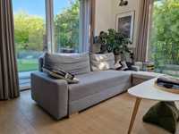 Rozkładana szara, solidna sofa Ikea Gralviken