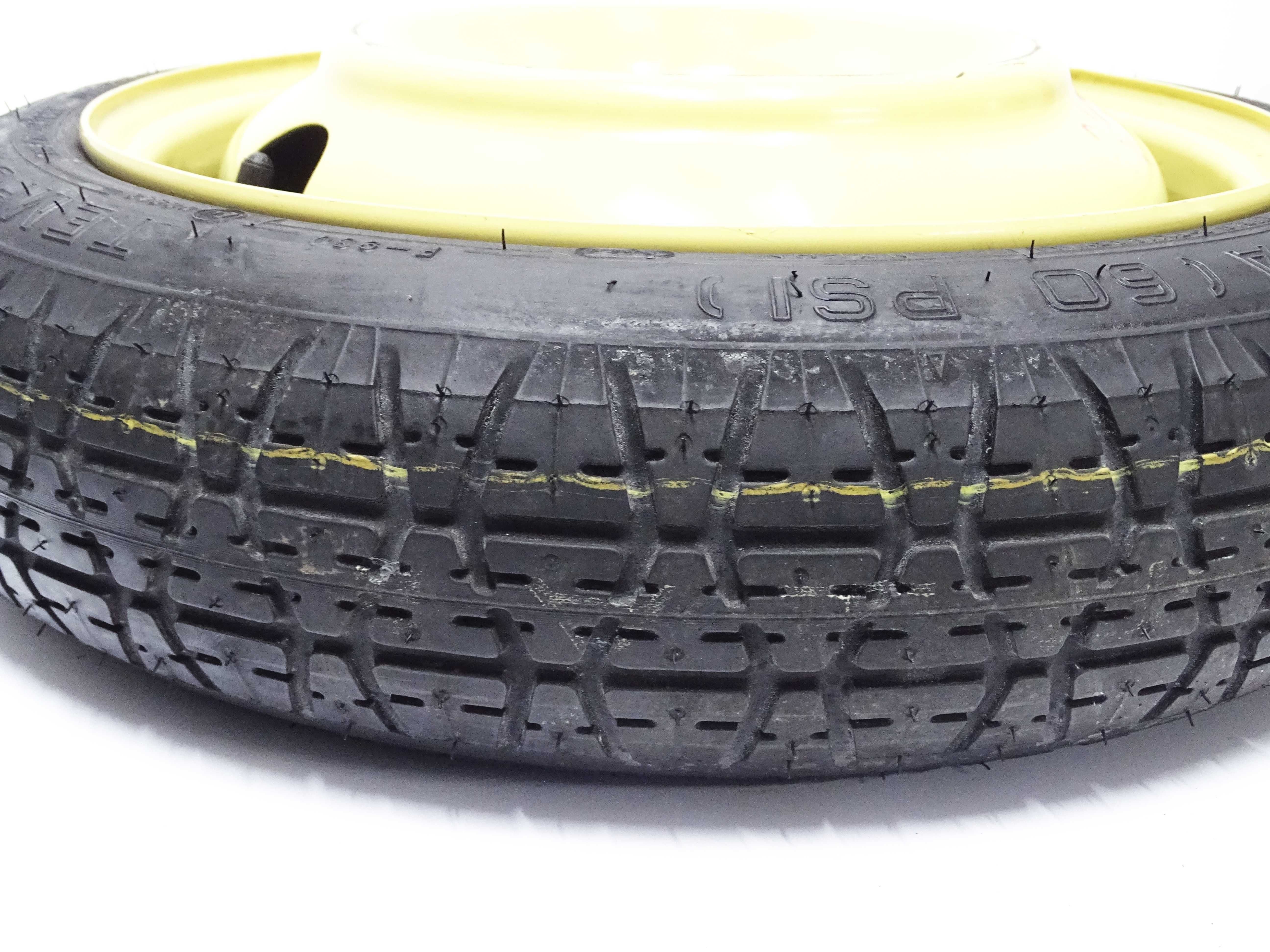 Koło dojazdowe VW 14x4T opona Dunlop 115/70D14 4x100