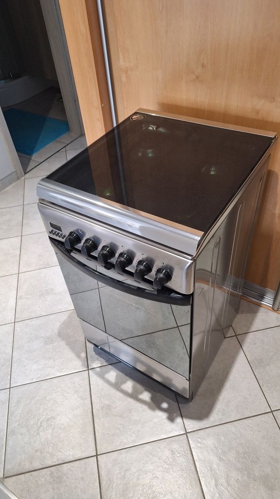 Kuchnia gazowo-elektryczna Hotpoint-Ariston C 35S P6 (X) stan wzorowy