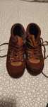 Botas de pele castanhas