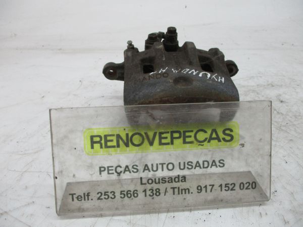 Pinça travão / maxila de travão frente esquerda HYUNDAI H100 Combi (P)