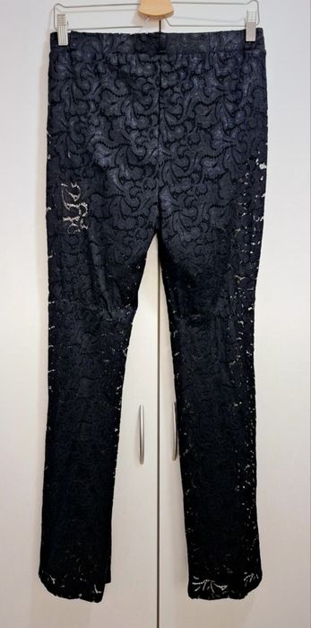 Nowe spodnie koronkowe rozszerzane Calzedonia r. L