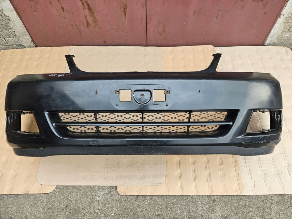 TOYOTA COROLLA E12 04-06 ZDERZAK KOMBI SEDAN 209