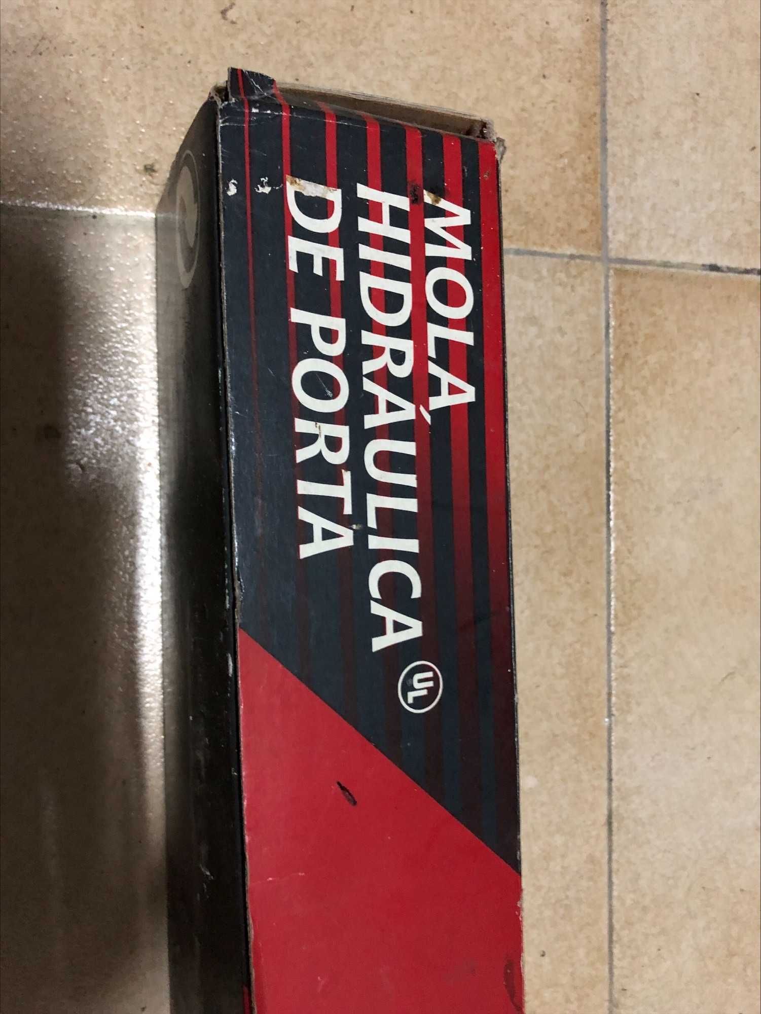 Mola hidráulica para porta