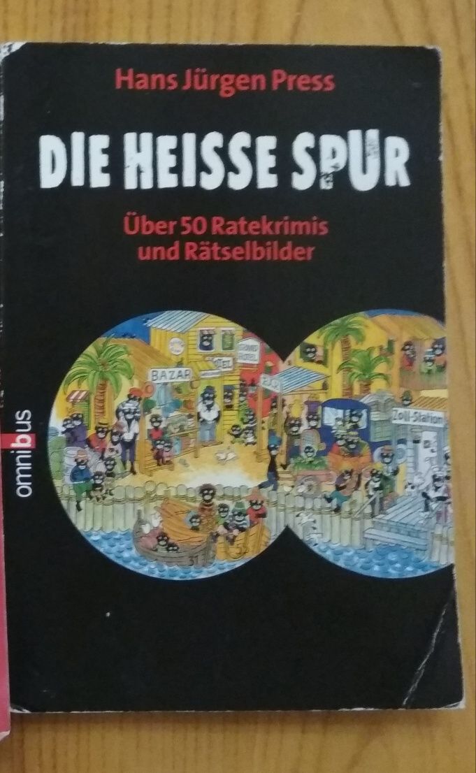 Книга головоломок німецькою для дітей