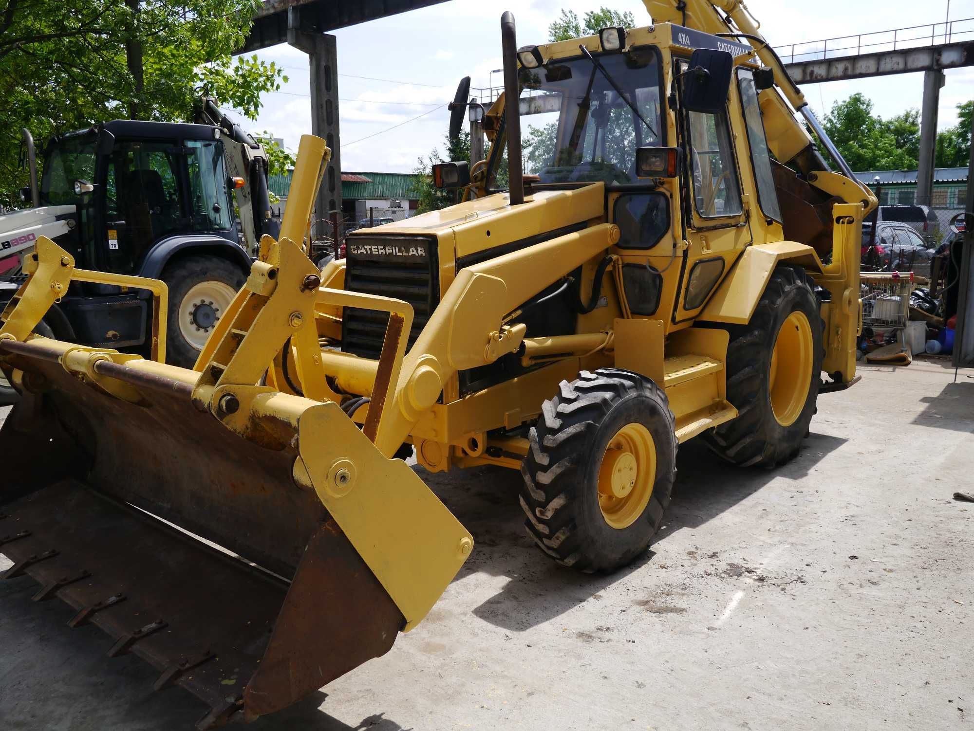 Koparko-ładowarka Caterpillar 428, 1990r