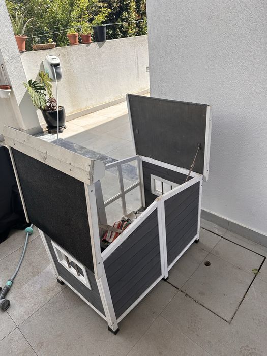 Casa para cães em madera
